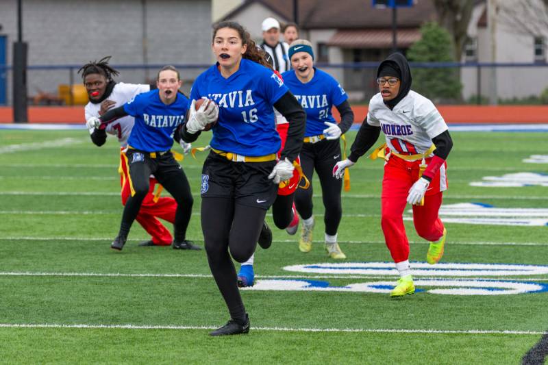Isabella Walsh heads to the endzone.  Photo by Steve Ognibene