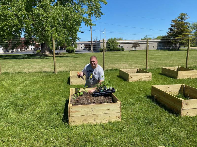 Tom Tharp with community garden