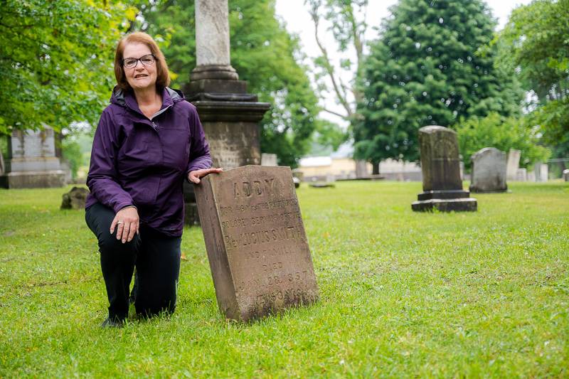 Sharon Burkel with Addy gravestone