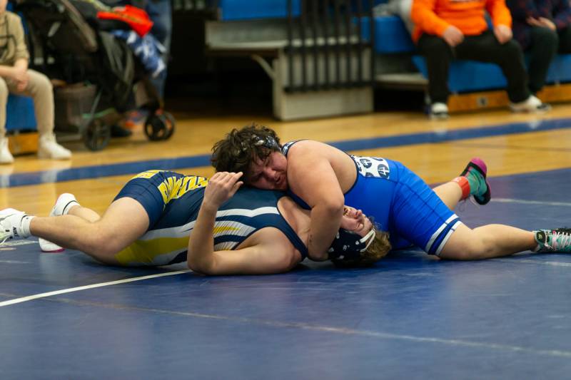 Nate Heusinger sets up for a pin in the closing seconds of the third round of his match.  Photo by Steve Ognibene