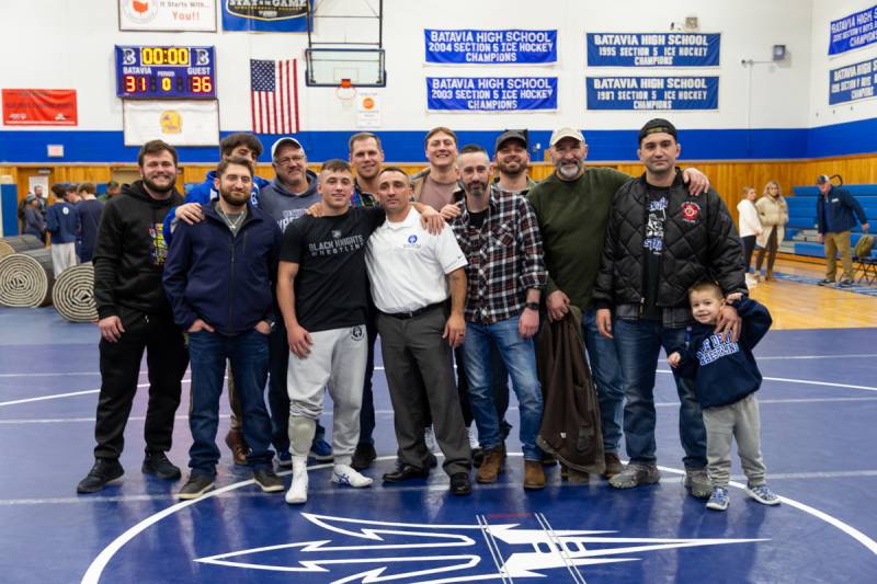 Many former student athletes and coaches came out for Coach Stewart's last home match in Batavia.  Photo by Steve Ognibene