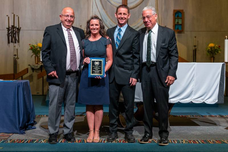 Adult helpers Pete and Sarah Welker recieving an award