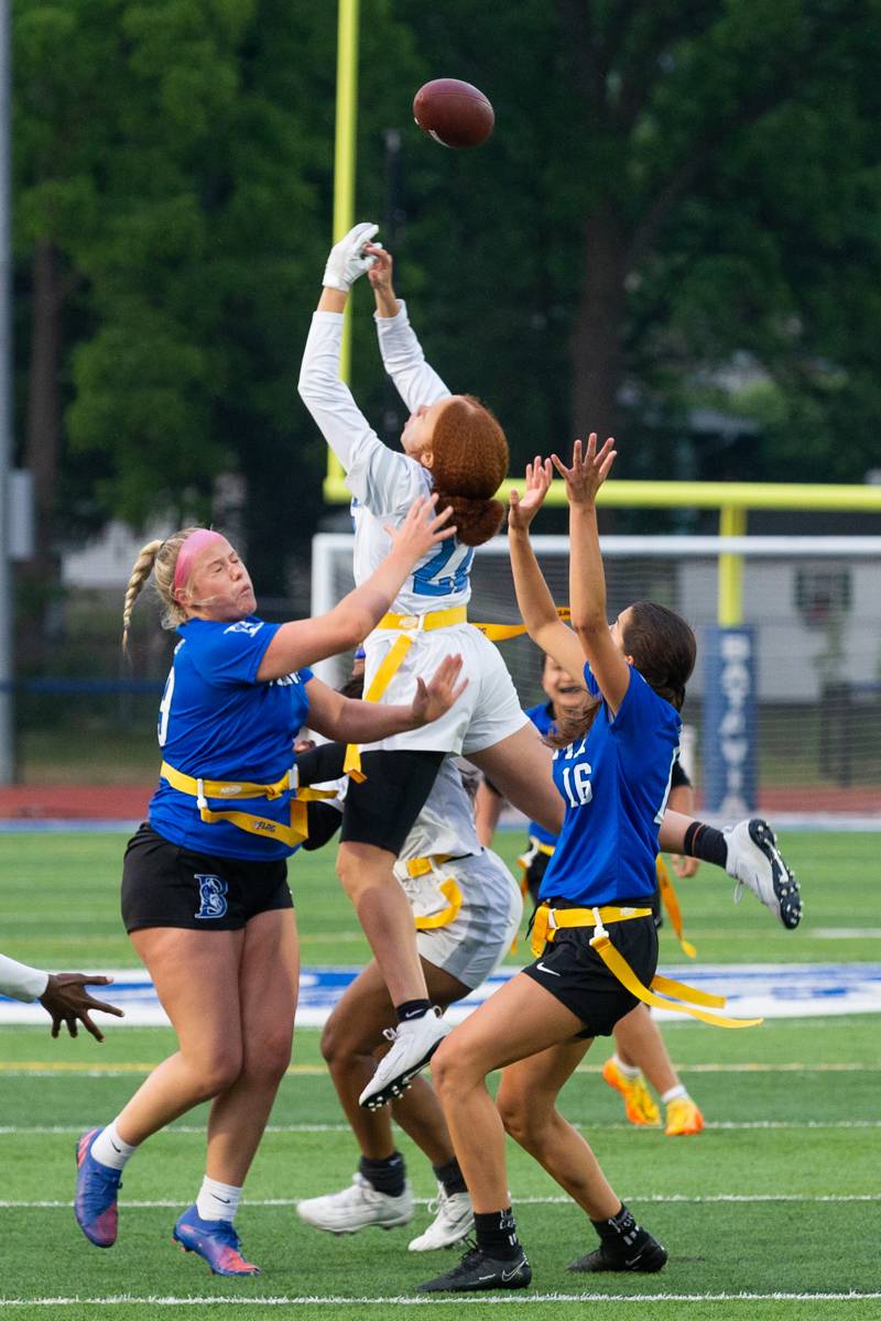 Batavia defenders disturbing the Eastridge offensive pass.