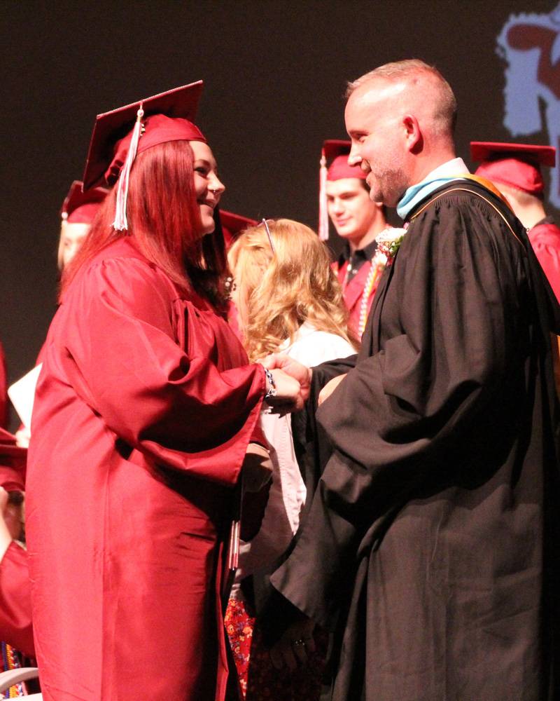 bb-grads_grad-shakes-hand-with-superintendent.jpg