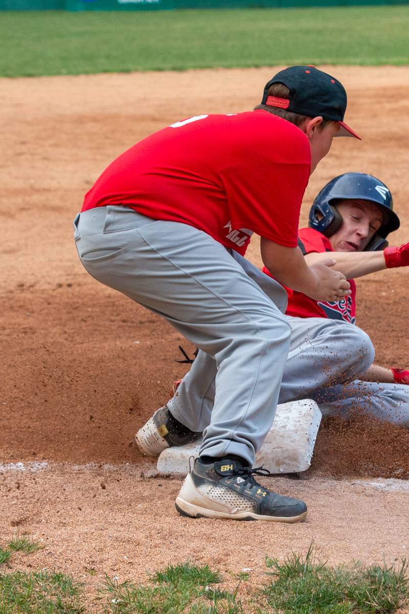 LeRoy player safe on third base.  Photo by Steve Ognibene