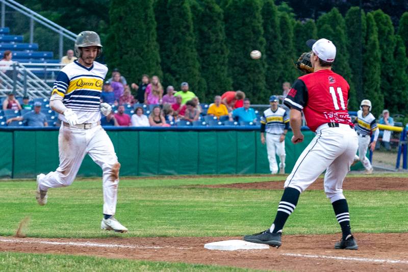 Turning two with a double play at first base.  Photo by Steve Ognibene