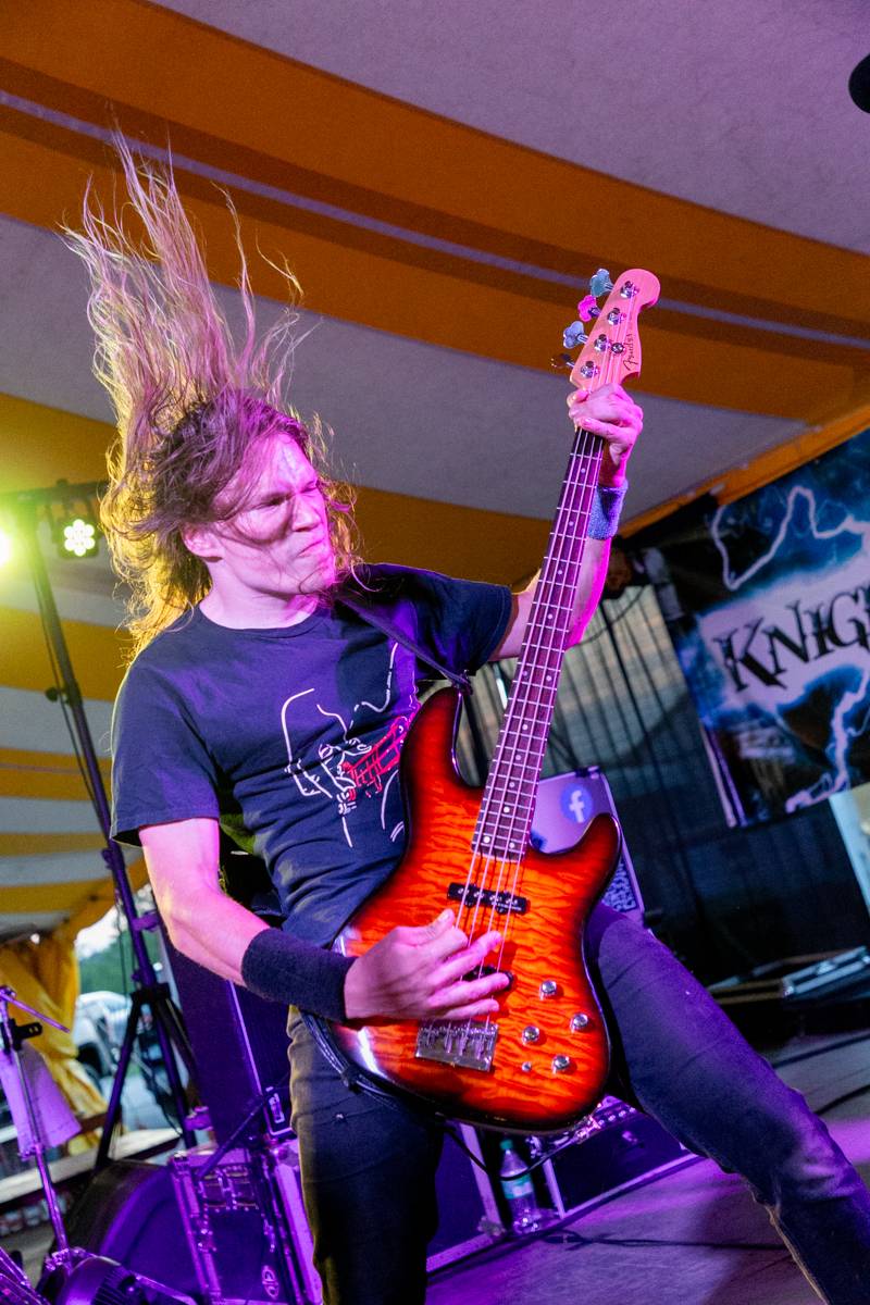 Knight Patrol band headlines the music tent, Sunday evening.  Photo by Steve Ognibene