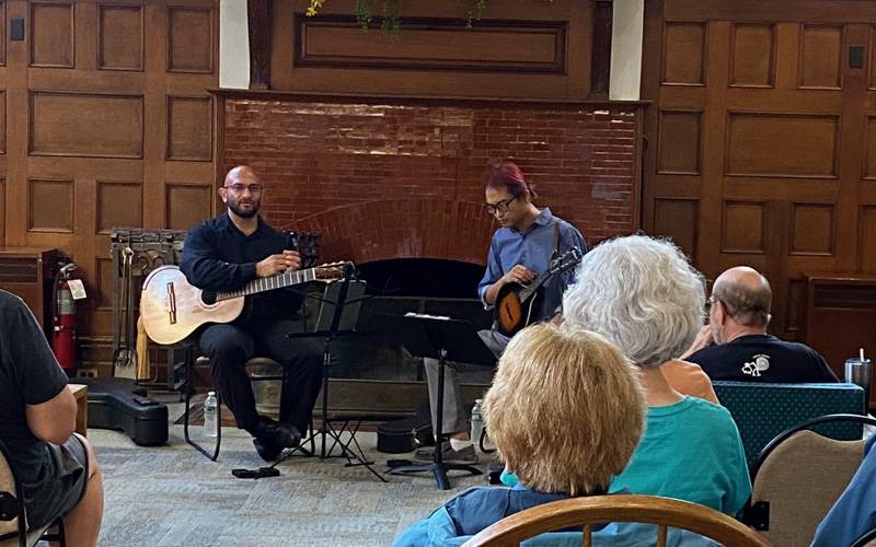 Guitar duo with crowd