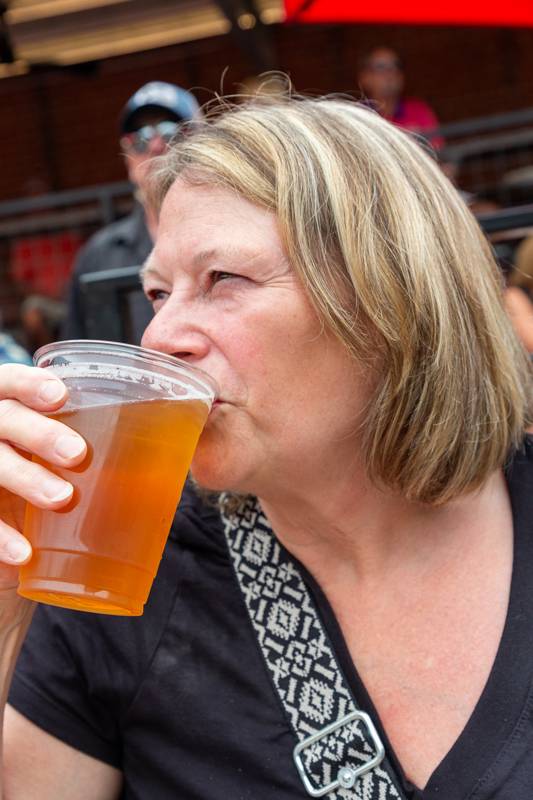 Woman with beer at Ramble