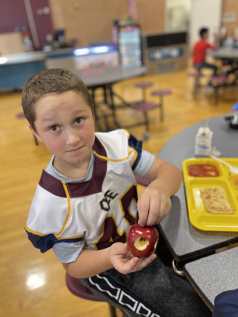 Elba boy with apple