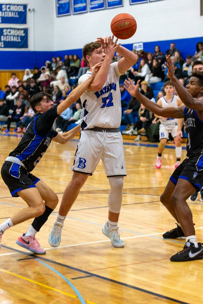 Gavin White double teamed trying to score.  Photo by Steve Ognibene