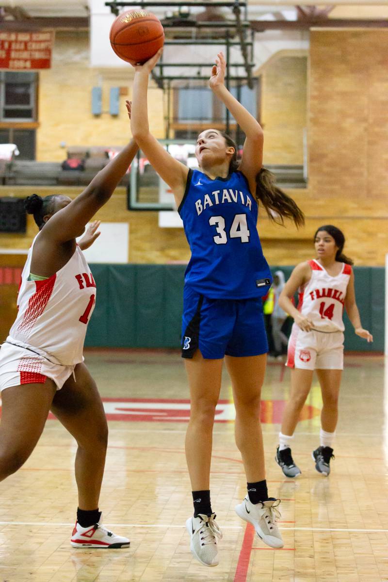 Isabella Walsh scoring two points for batavia.  Photo by Steve Ognibene