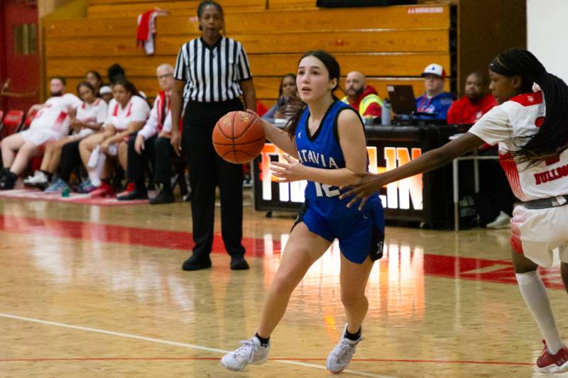 Violet Lopez driving down the court.  Photo by Steve Ognibene