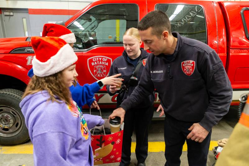 Batavia Fire Department staff receiving gifts.  Photo by Steve Ognibene