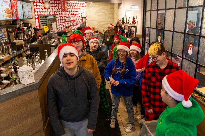 Caroling at Tim Hortons.  Photo by Steve Ognibene