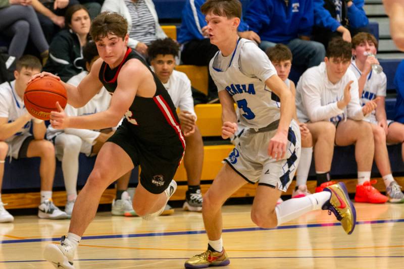 Race to the basket.  Photo by Steve Ognibene