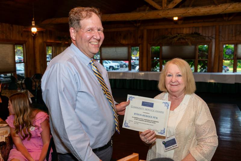 Donna West presented a service award to Byron Bergen FFA  Photo by Steve Ognibene