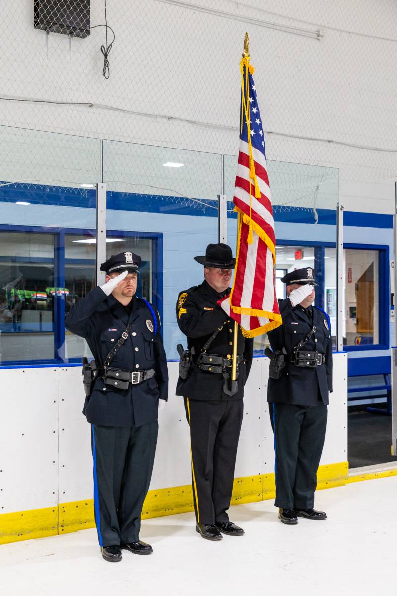 Genesee County Sheriff honorguard colors during the national anthem.  Photo by Steve Ognibene