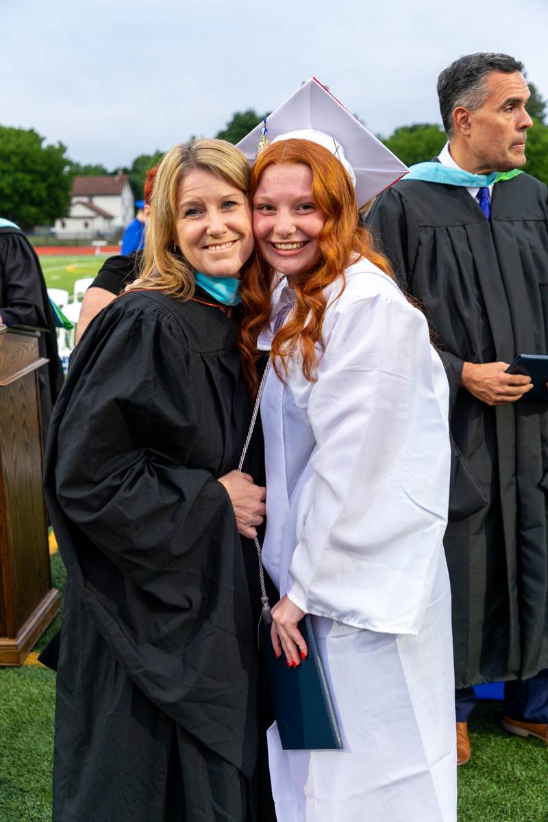 Teacher and Mother Melissa Mattice presents her daughter Kirsten mattice with her diploma  Photo by Steve Ognibene