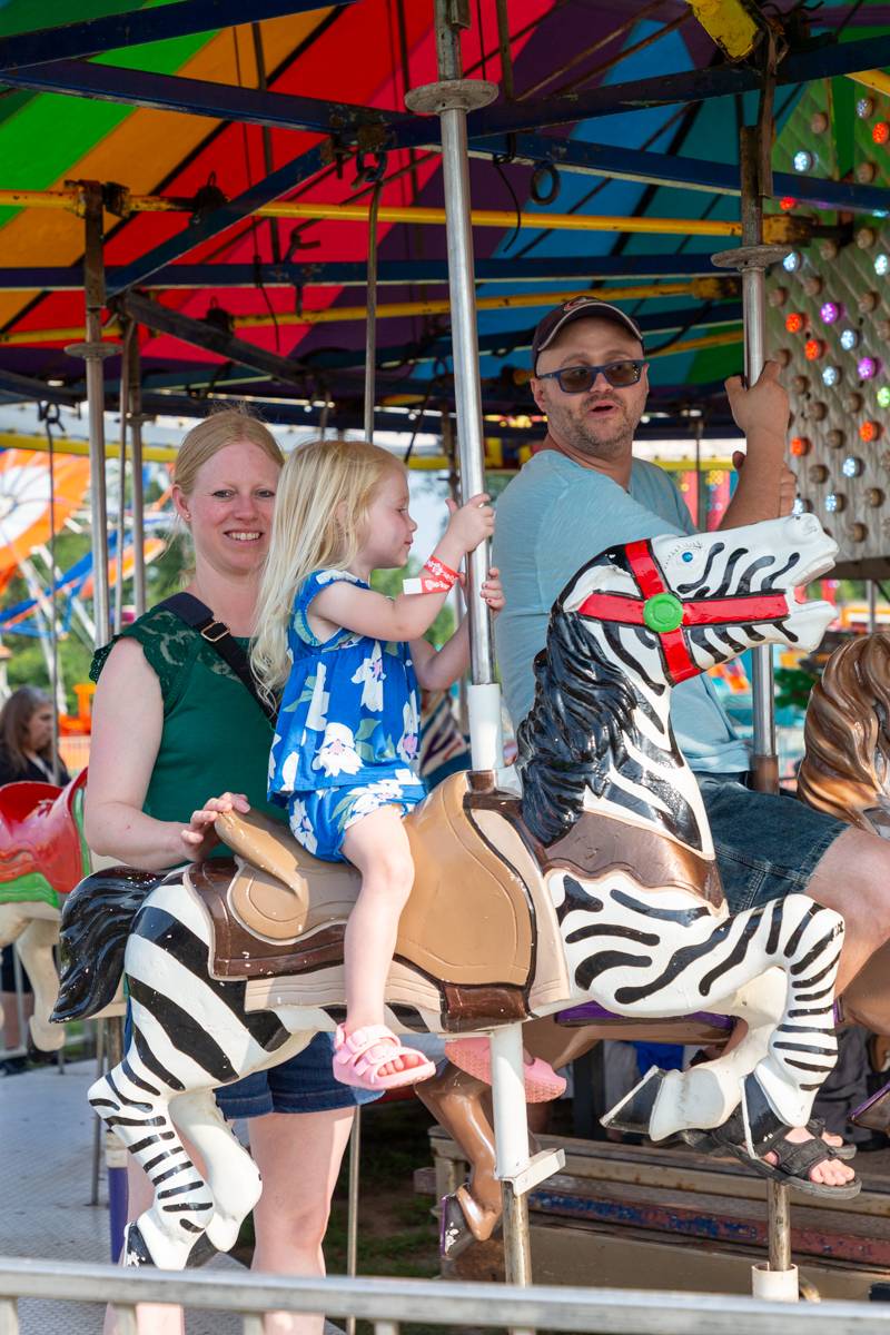 Lots of rides at the Fair to entertain families.  Photo by Steve Ognibene