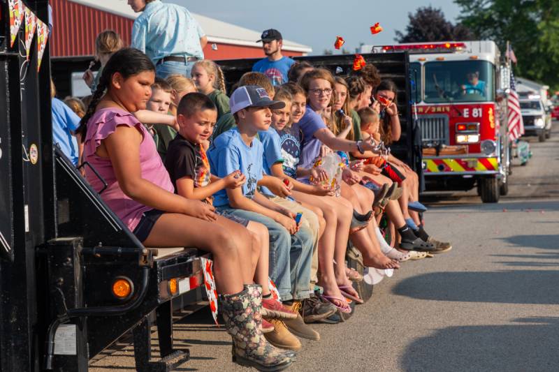 Large crowds gathered Tuesday afternoon of the 185th annual Genesee County Fair parade.  Photo by Steve Ognibene