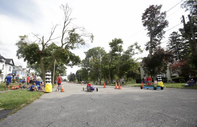 Kids racing boxcars in Batavia