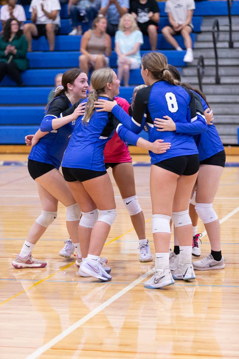 Celebration of a fourth set win by Batavia.  Photo by Steve Ognibene