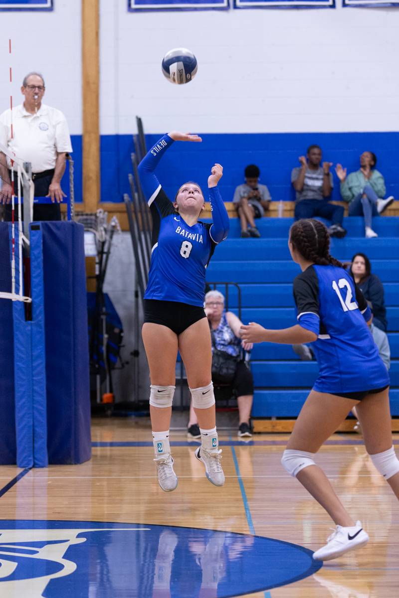 Lily Gray setting the ball for a kill.  Photo by Steve Ognibene