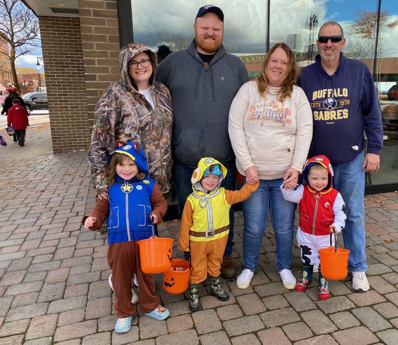 Family of trick or treaters