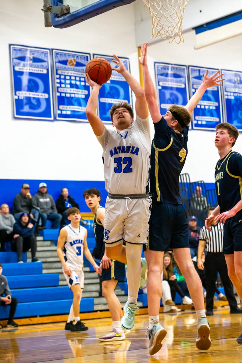  Gavin White going to the hoop in second half to keep batavia ahead. Photo by Steve Ognibene