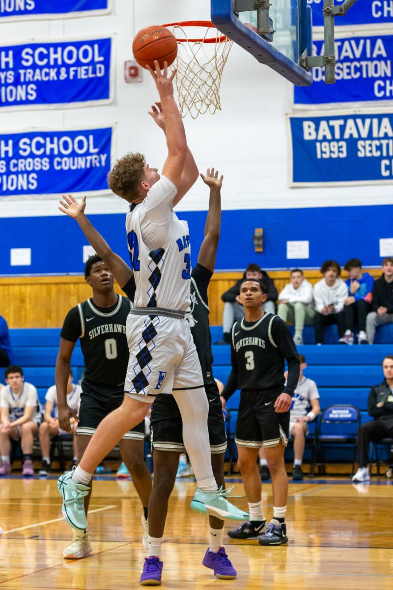  Batavia's Gavin White goes for two points.  Photo by Steve Ognibene