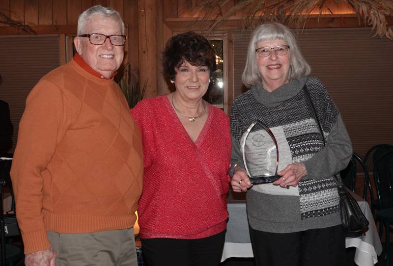 anna-marie-barclay-presenting-an-award-to-ed-and-ginny-adams